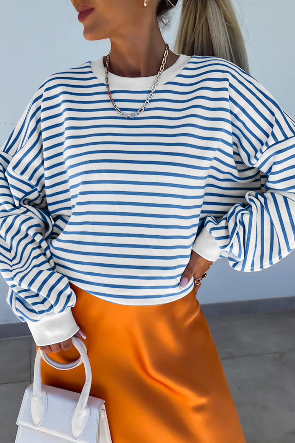 Chic blue striped oversized sweatshirt with drop shoulders