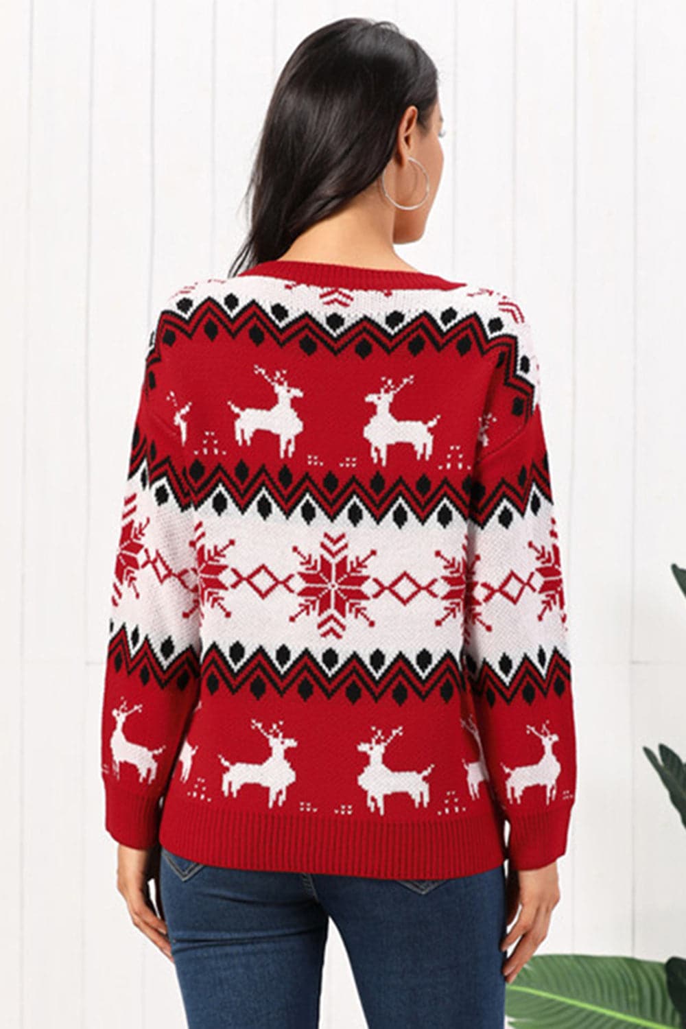 Reindeer Round Neck Sweater.