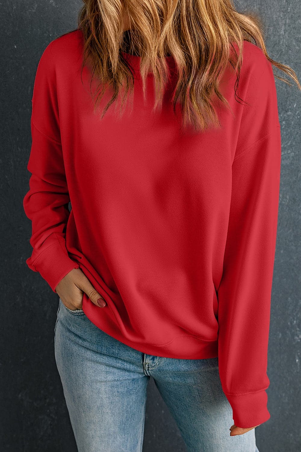 Round Neck Dropped Shoulder Sweatshirt.