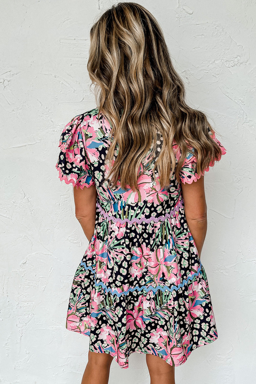 Flirty pink floral tiered mini dress with ricrac accents