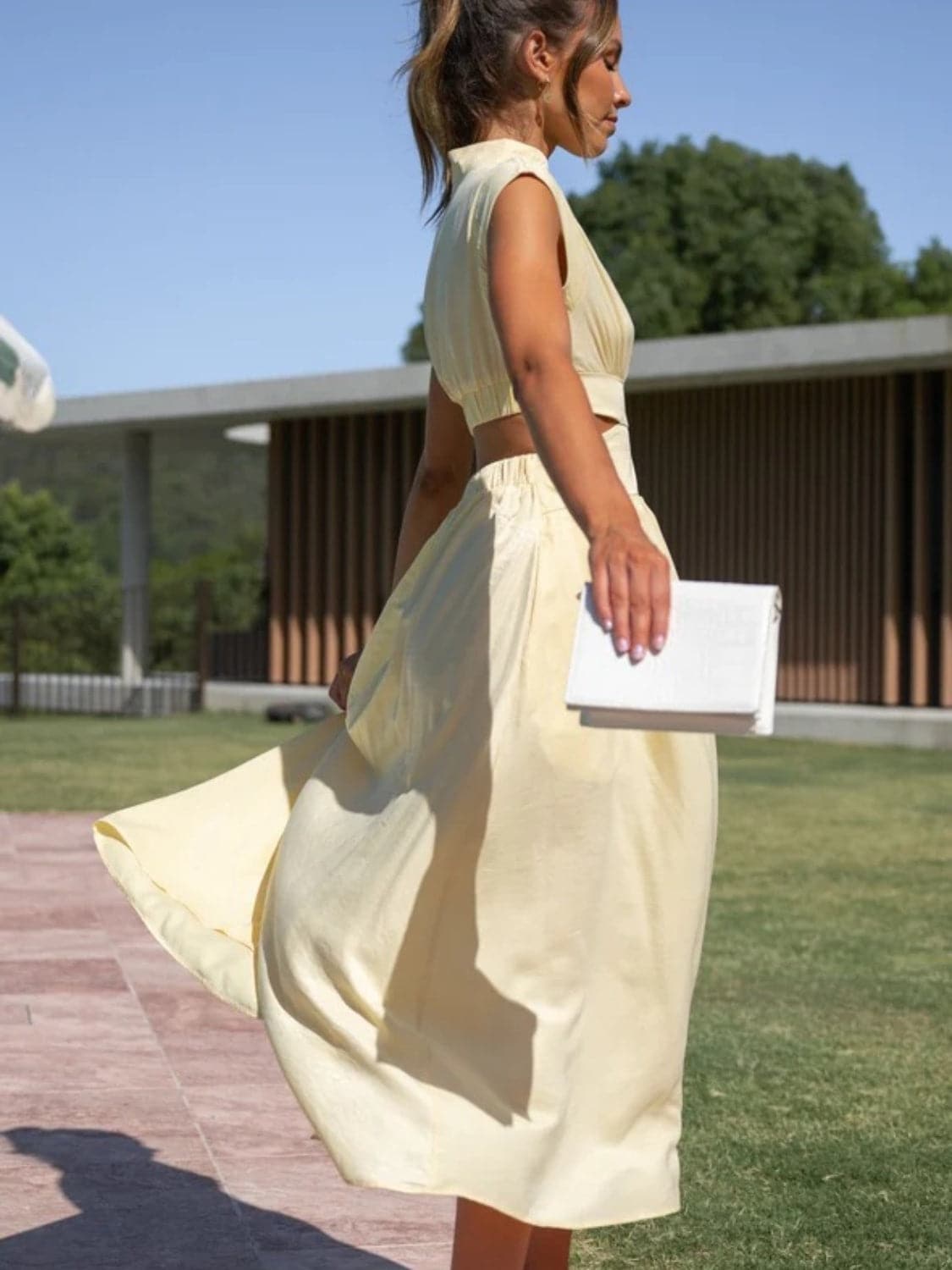 Cutout Mock Neck Sleeveless Ruched Dress.