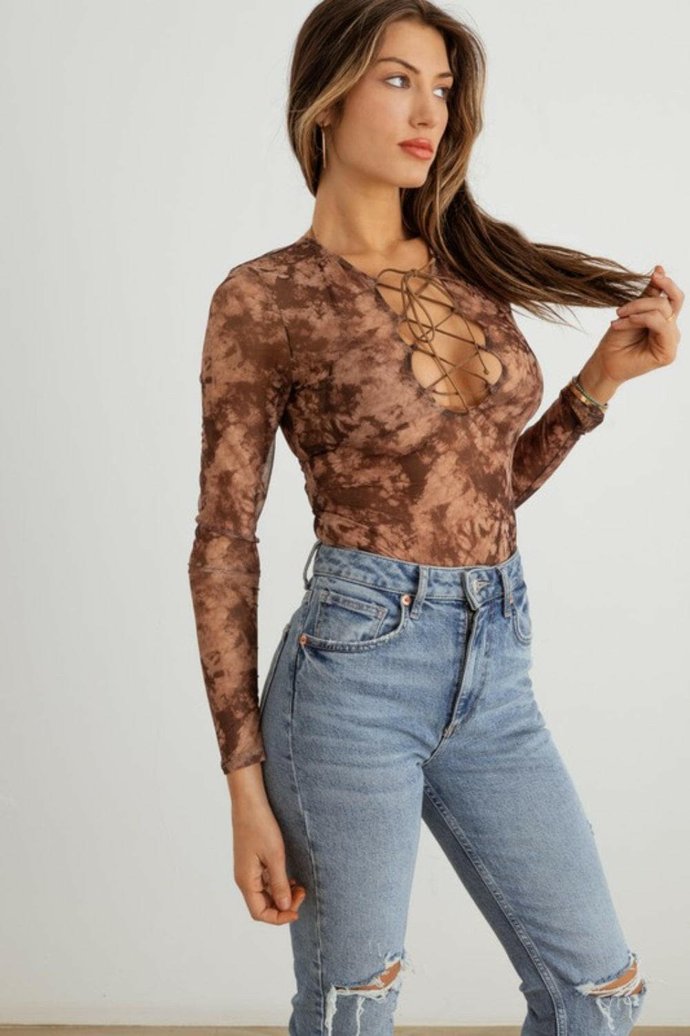 HERA COLLECTION Abstract Mesh Lace-Up Long Sleeve Bodysuit.