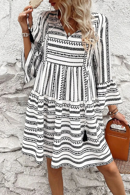 Chic printed tie neck mini dress with three-quarter sleeves