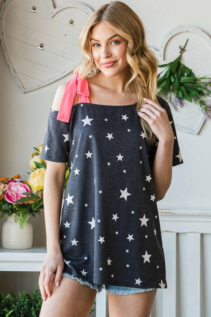 Heimish Full Size Star Print Asymmetrical Neck Short Sleeve Top.