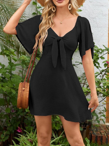 Breezy Charm Smocked Flutter Dress