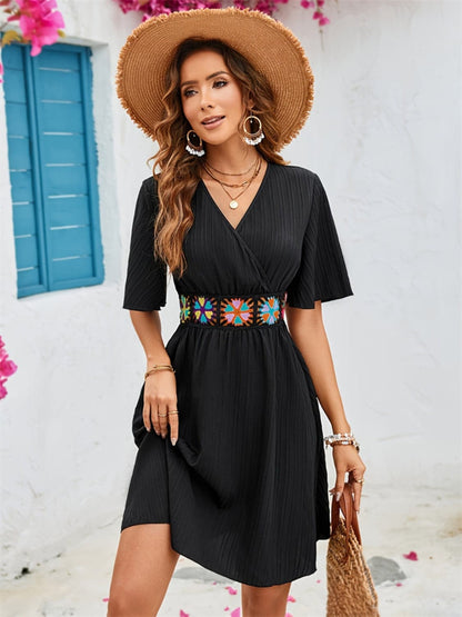 Surplice Flutter Sleeve Mini Dress.