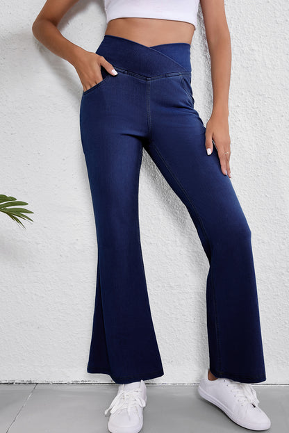 Dusk blue elastic flare jeans with crossed waist design