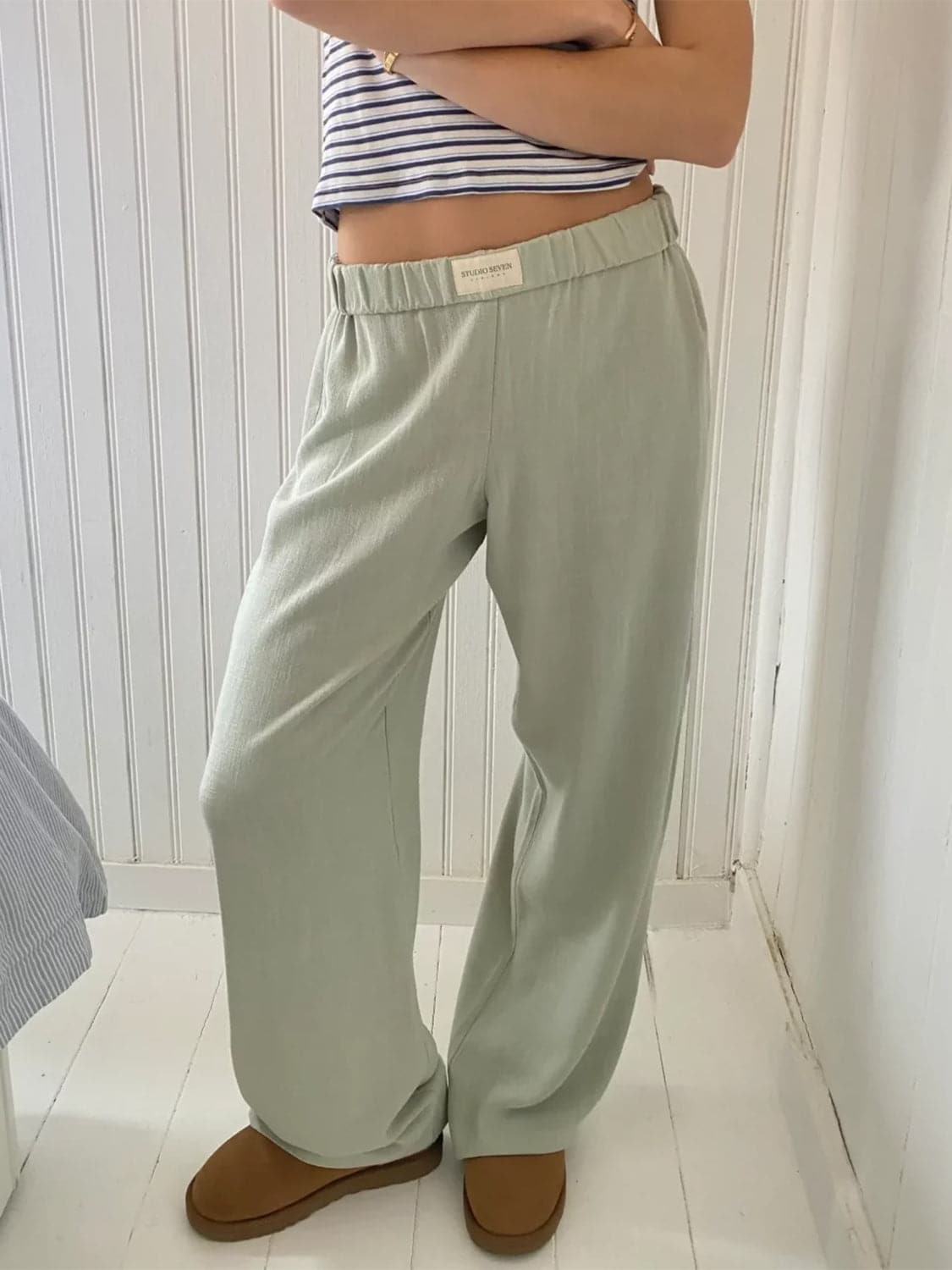 Chic sheer pocketed wide leg trousers with elastic waist