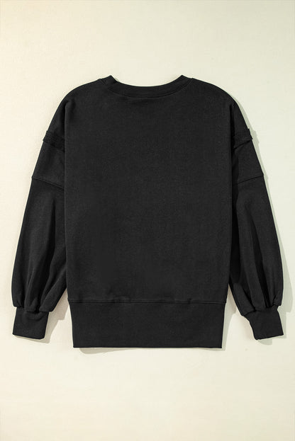 Chic black drop shoulder sweatshirt