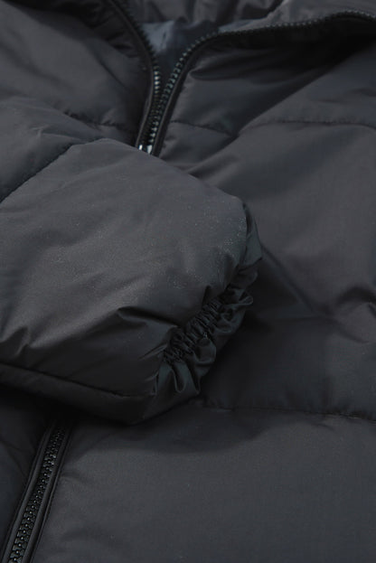 Sleek black winter puffer coat