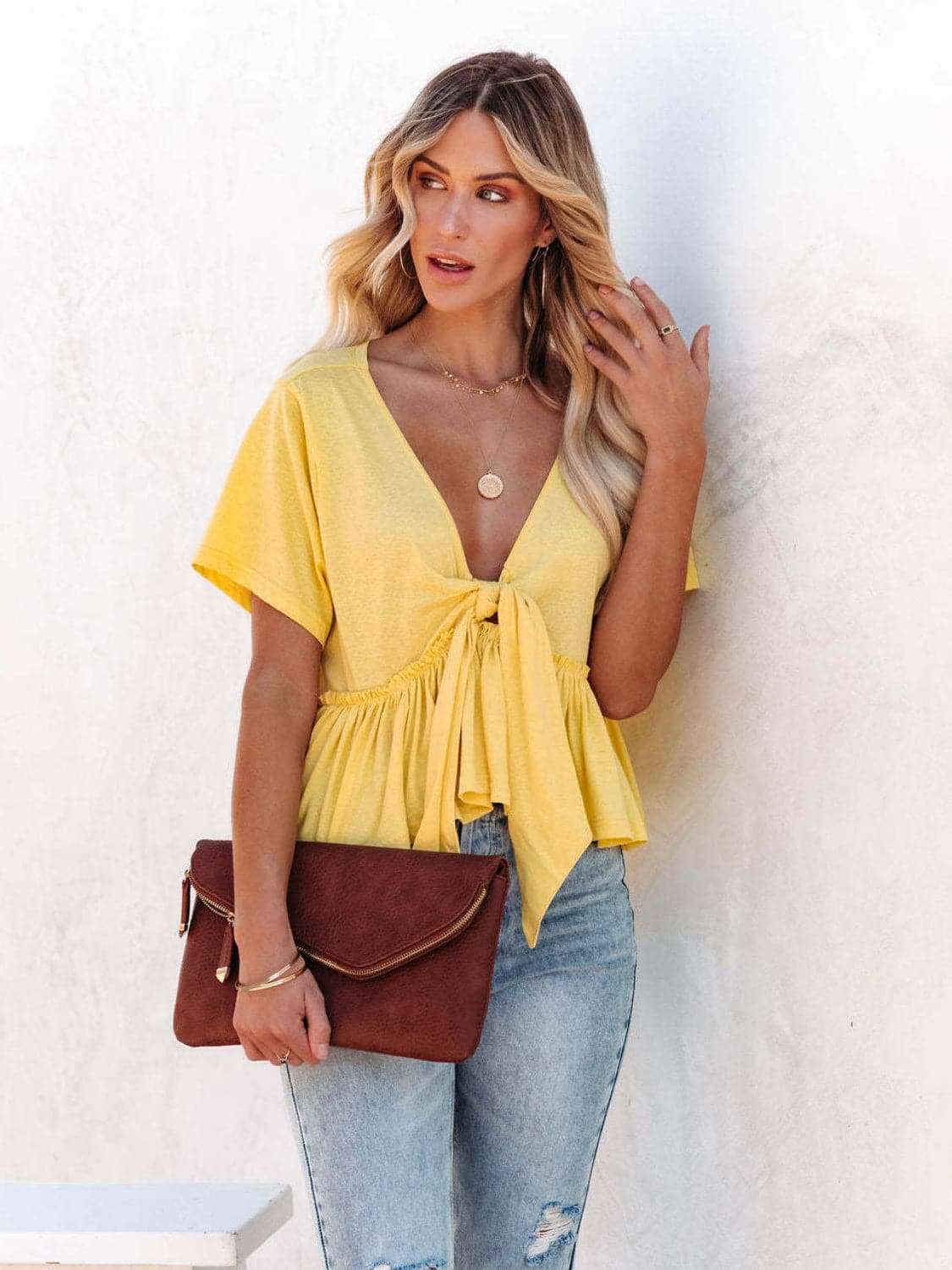 Tied Plunge Short Sleeve Blouse.