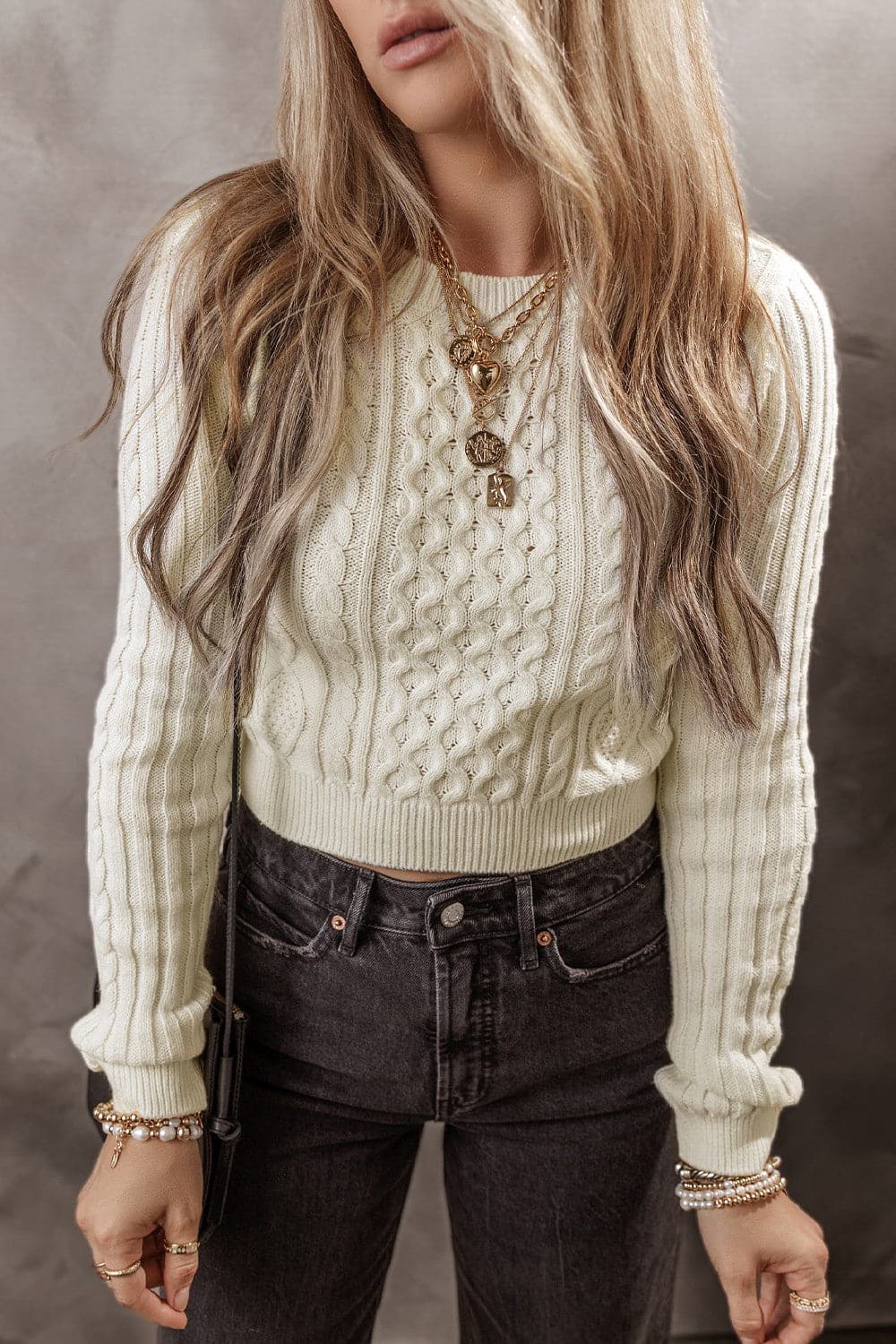 Cable-Knit Round Neck Long Sleeve Sweater.