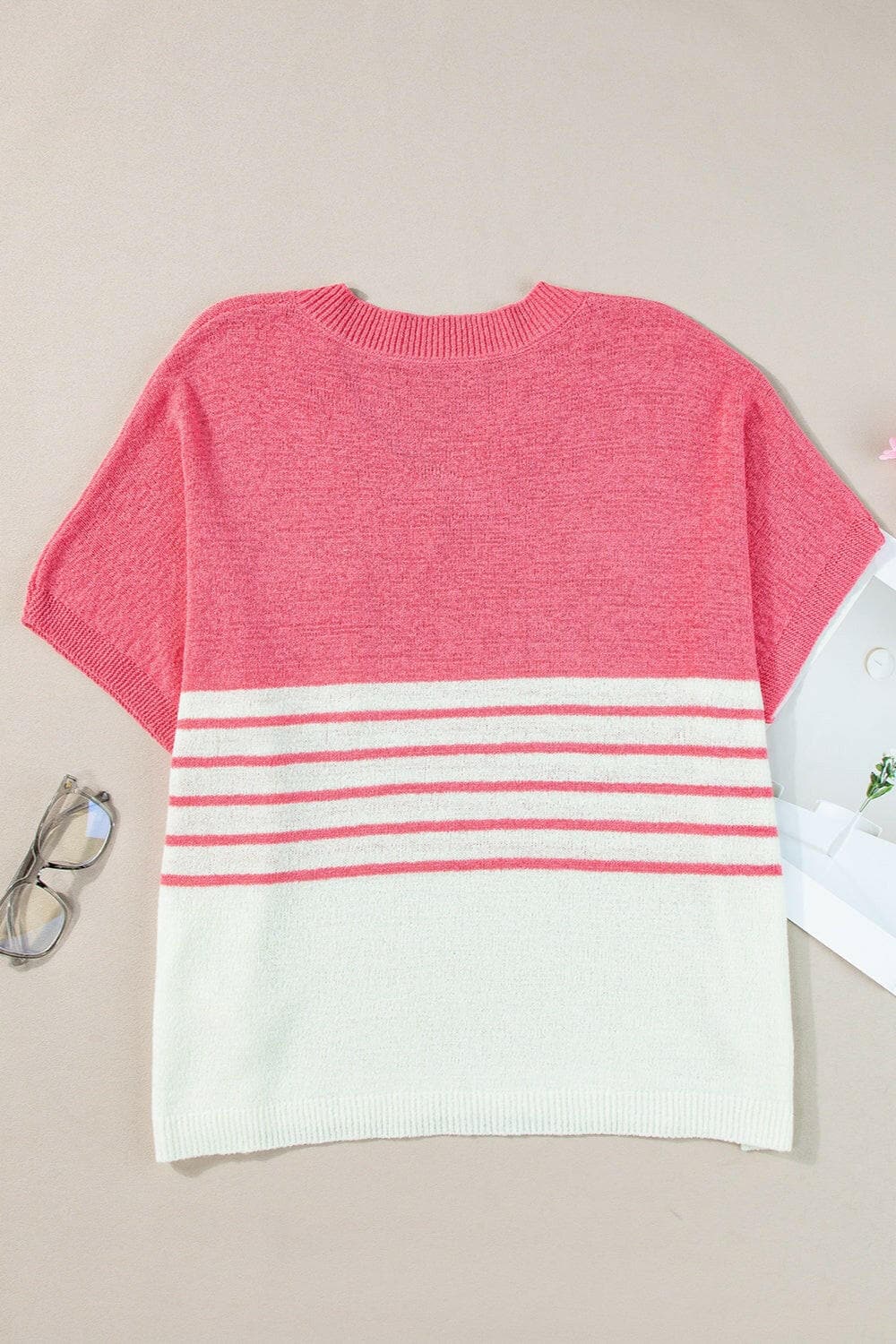 Striped V-Neck Short Sleeve Knit TopStriped V-Neck Short Sleeve Knit Top
 Upgrade your wardrobe with our versatile Striped V-Neck Short Sleeve Knit Top. Crafted for comfort and style, this top is a musLove Salve -Neck Short Sleeve Knit TopKnit Tops