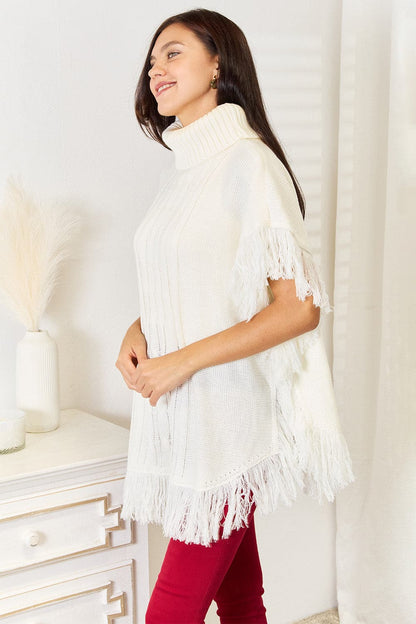 Justin Taylor Turtle Neck Fringe Poncho.