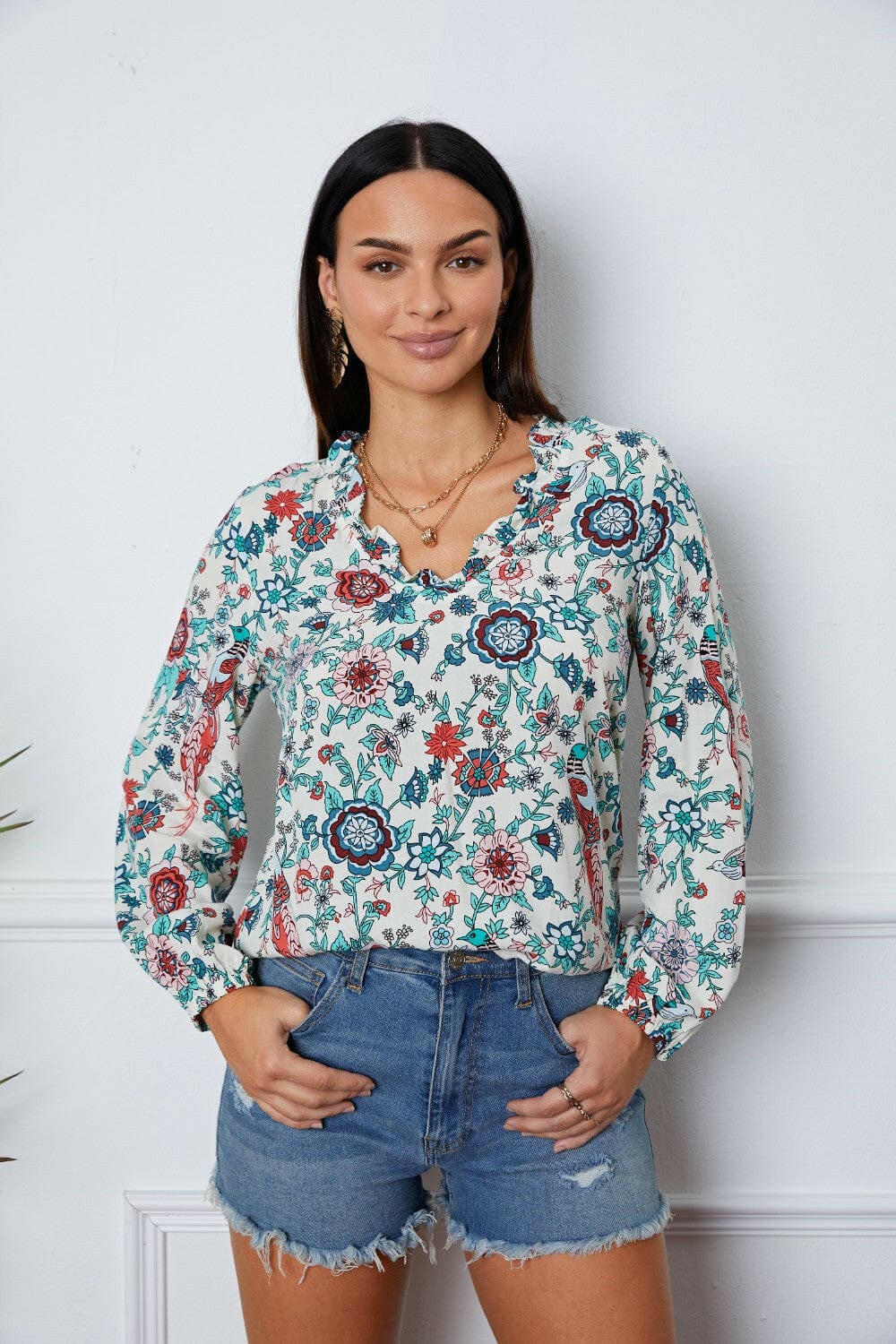 Floral Notched Long Sleeve Blouse.