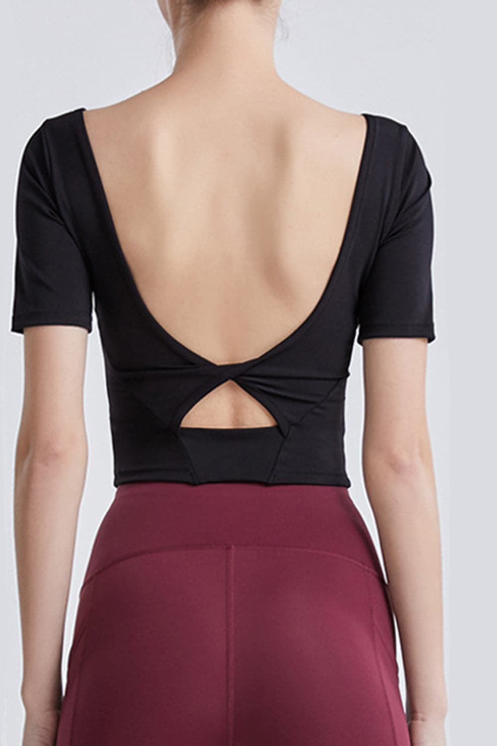 Cutout Backless Round Neck Active T-Shirt.