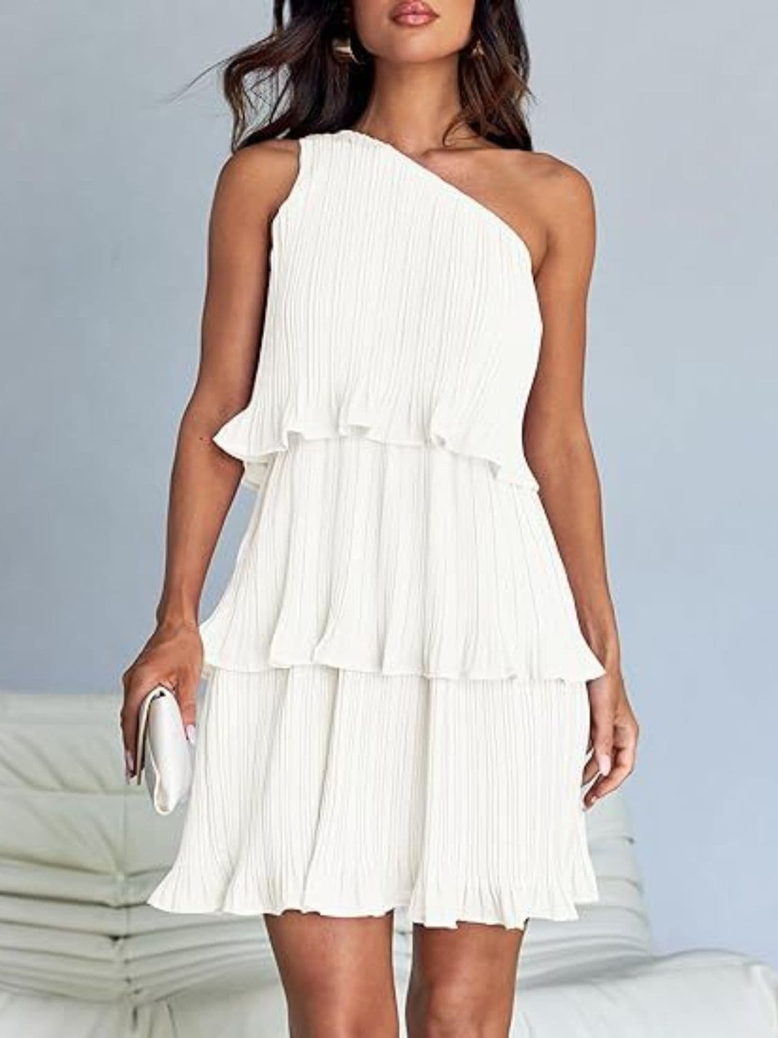 Chic sheer mini dress with ruffles, one-shoulder design, white color, layered details.