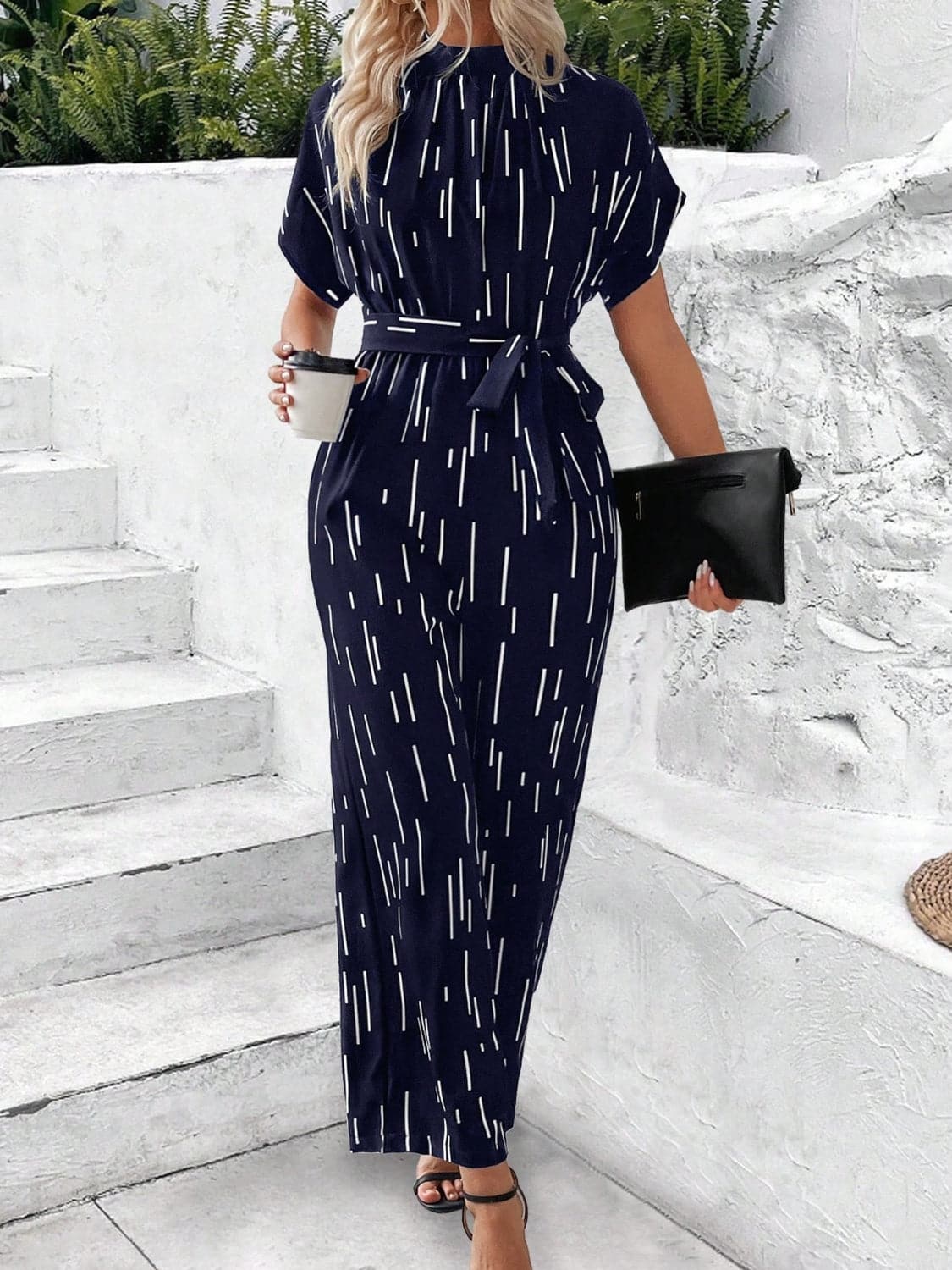 Tied Printed Mock Neck Wide Leg Jumpsuit.