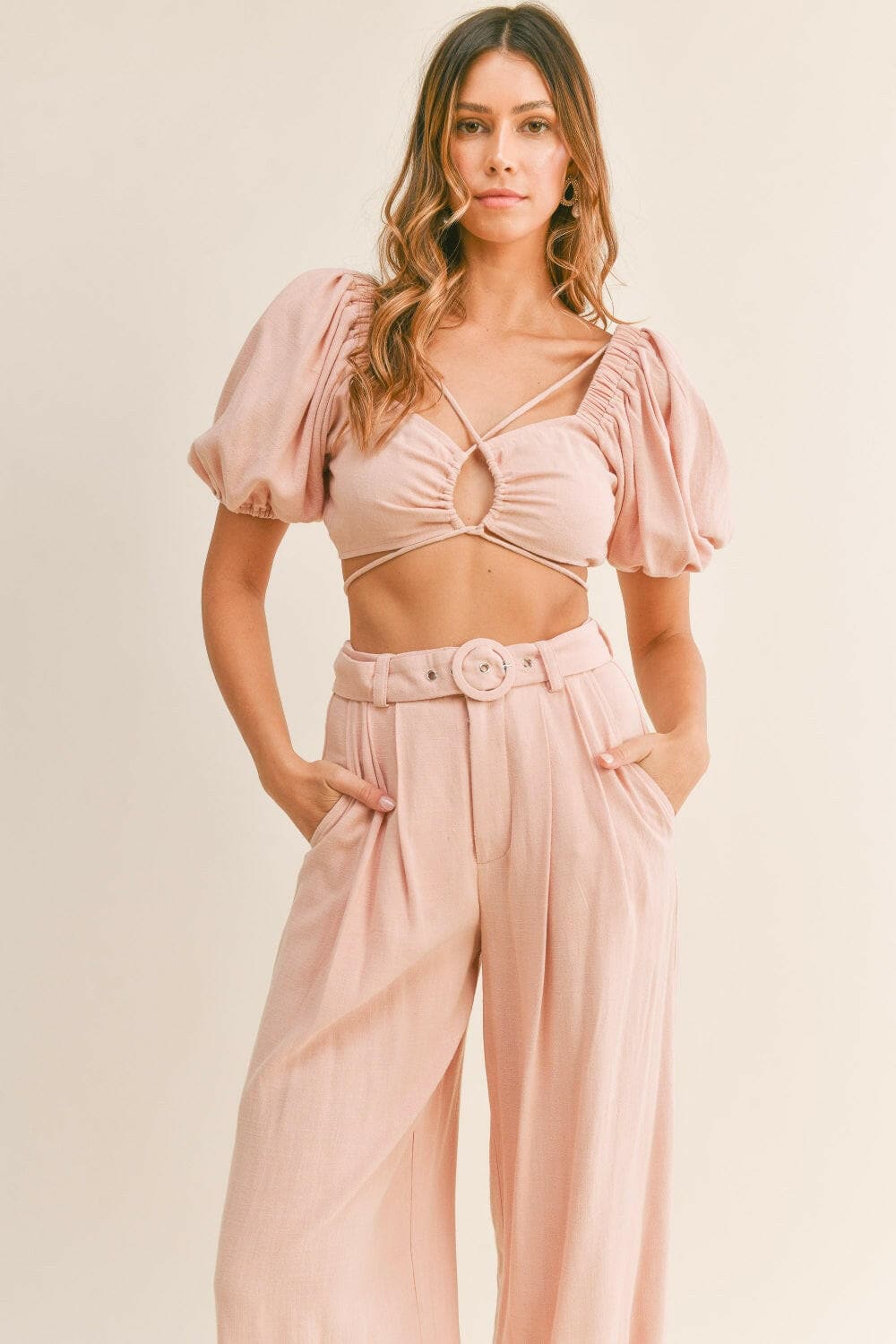 MABLE Cut Out Drawstring Crop Top and Belted Pants SetIndulge in Effortless Style
 Enhance your wardrobe with the MABLE Cut Out Drawstring Crop Top and Belted Pants Set, a charming ensemble that exudes sophistication anLove Salve Drawstring Crop Topjust arrived