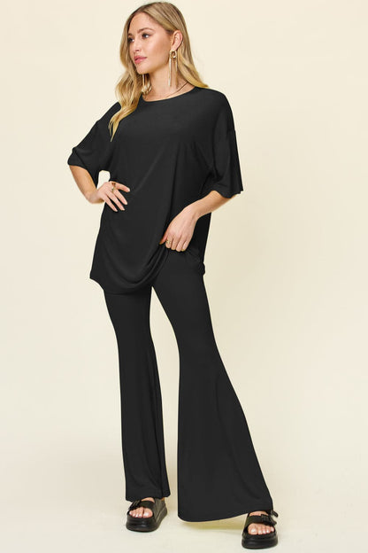 Double Take Full Size Round Neck Drop Shoulder T-Shirt and Flare Pants Set.