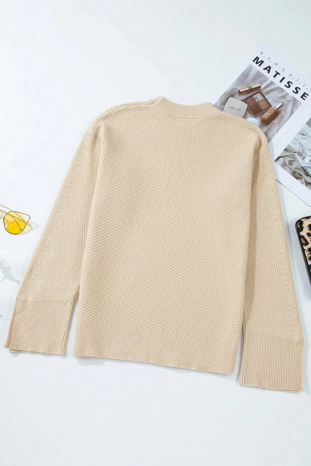 Chic textured long sleeve sweater with stylish slit detail