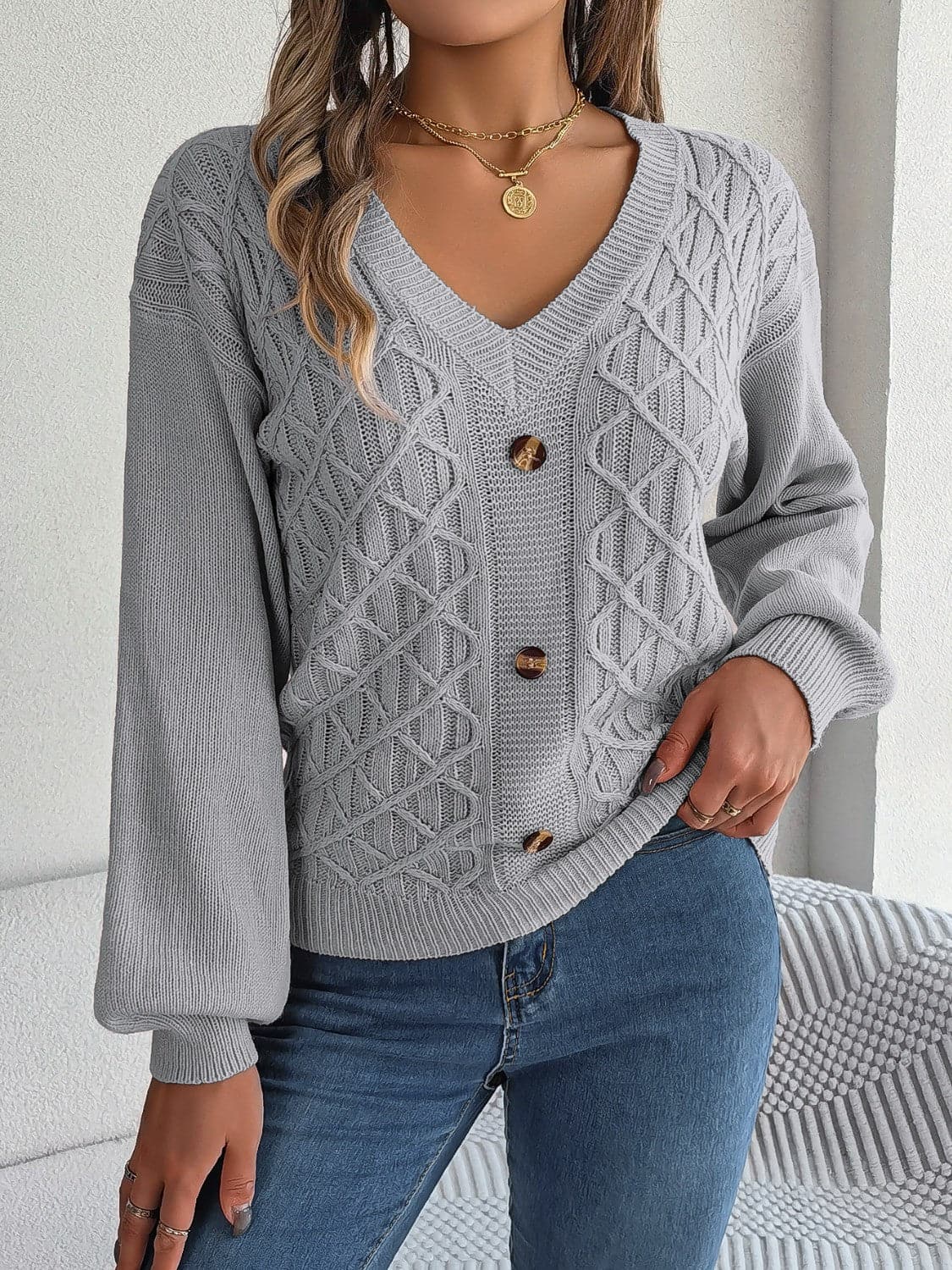 Cable-Knit V-Neck Lantern Sleeve Sweater.