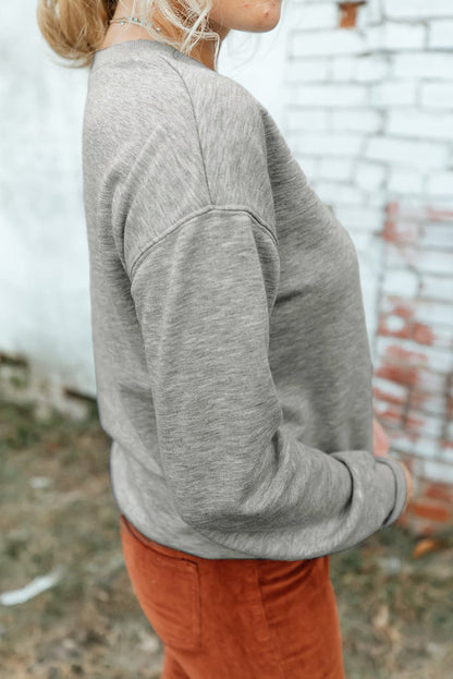 Round Neck Dropped Shoulder Sweatshirt.