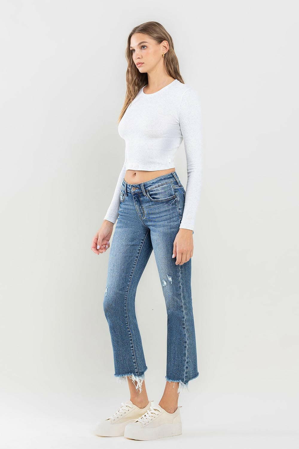 Lovervet Mid Rise Frayed Hem Jeans.