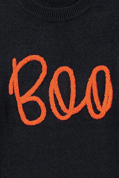 Cozy black "Boo" knitted sweater with ribbed edges for casual style