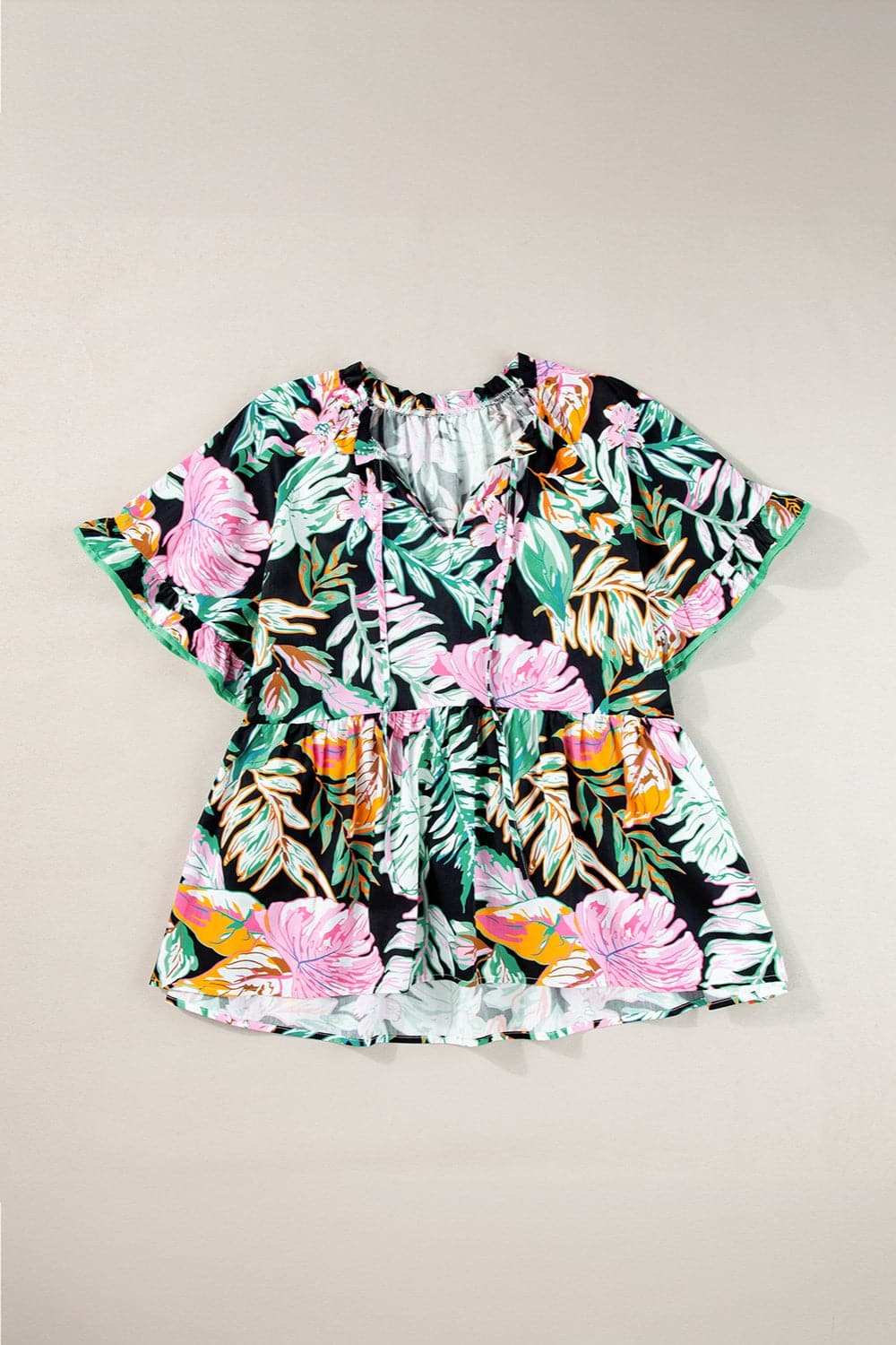 Plus Size Printed Tie Neck Short Sleeve Blouse.