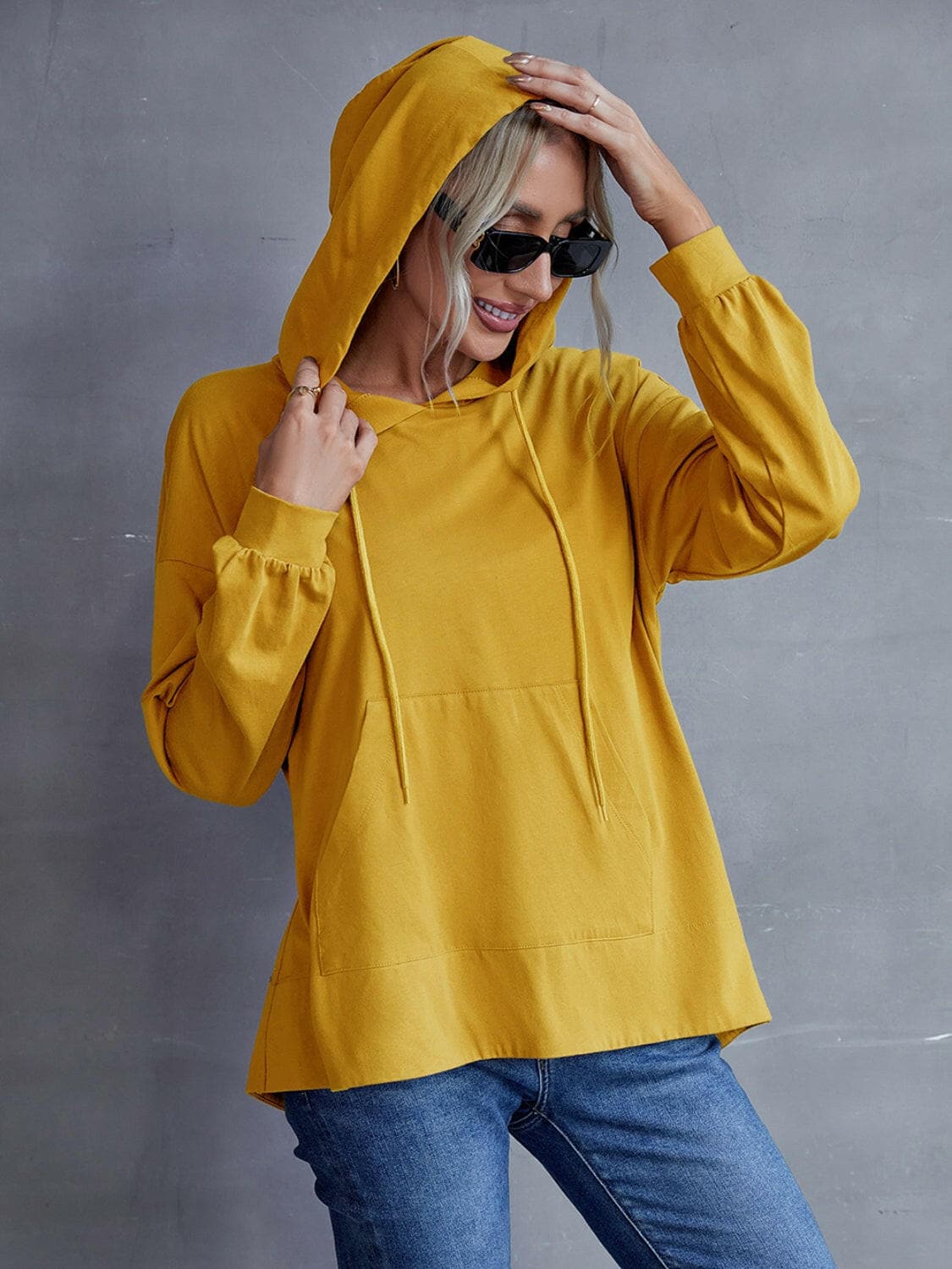 Drawstring Pocketed Dropped Shoulder Hoodie.