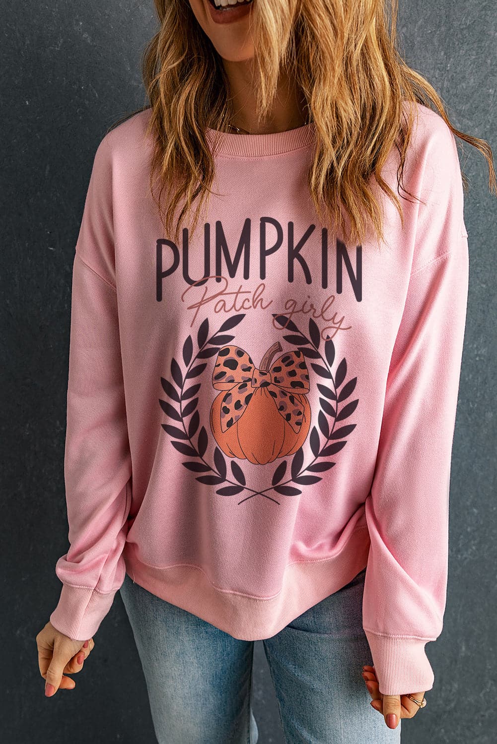 Pumpkin Round Neck Long Sleeve Sweatshirt.