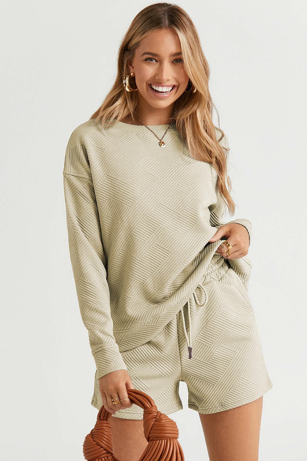 Double Take Full Size Texture Long Sleeve Top and Drawstring Shorts SeElevate Your Loungewear with Our Double Take Set
 Step into comfort and style with the Double Take Full Size Texture Long Sleeve Top and Drawstring Shorts Set. This Love Salve Full Size Texture Long Sleeve Topusa