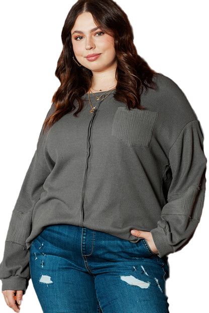 Chic dark grey plus size crinkle patchwork top with exposed seams