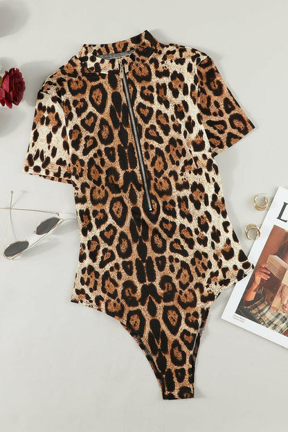 Leopard Half Zip Short Sleeve Bodysuit.