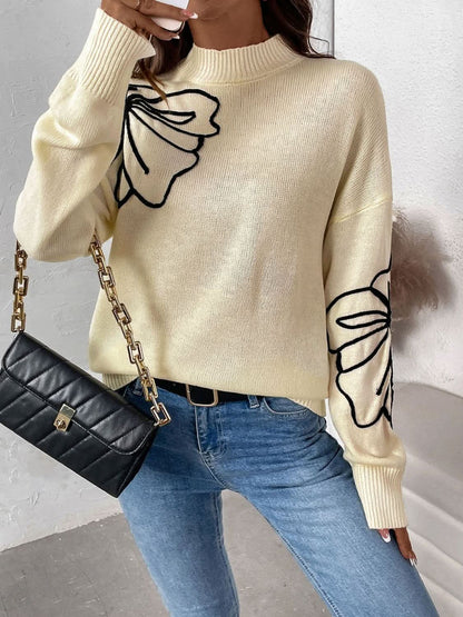 Cozy mock neck sweater with dropped shoulders and long sleeves