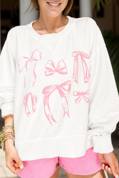 Bow round neck long sleeve sweatshirt with pink bow designs, made from polyester, viscose, and elastane.