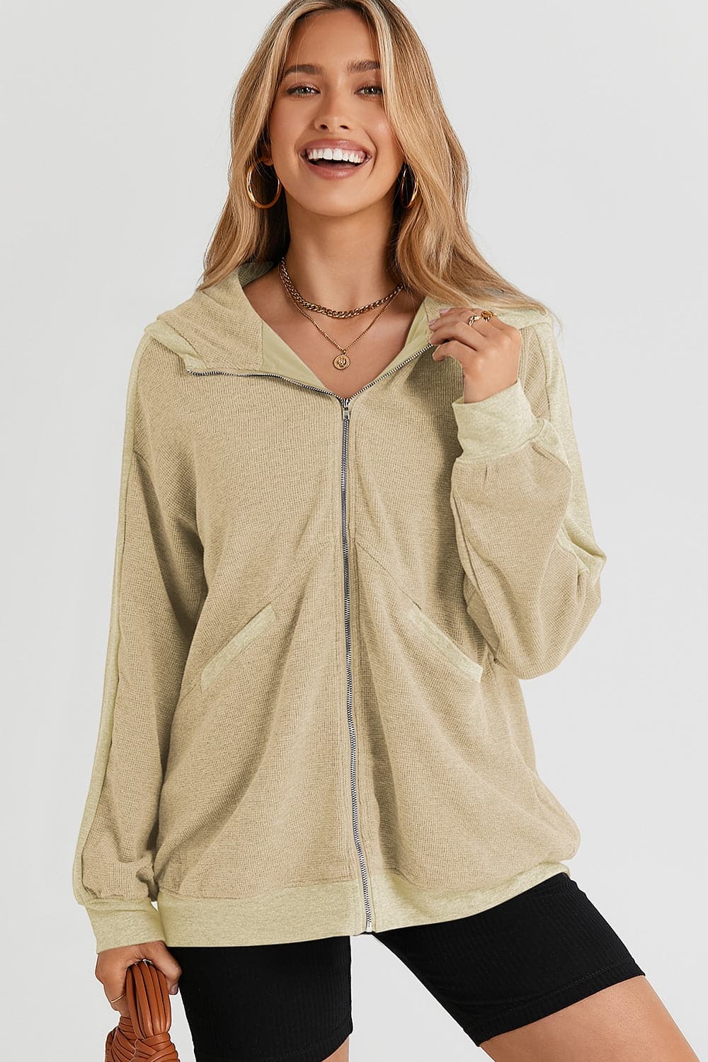 Pocketed Zip Up Dropped Shoulder Hooded Jacket.