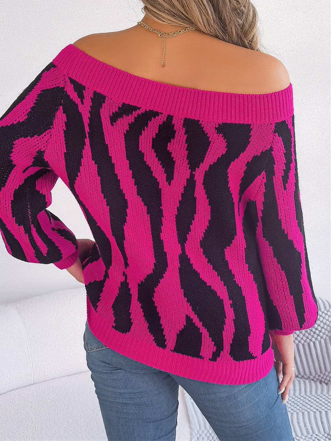 Off-Shoulder Animal Print Long Sleeve Sweater.