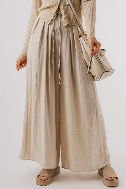 Beige high-waisted wide-leg trousers