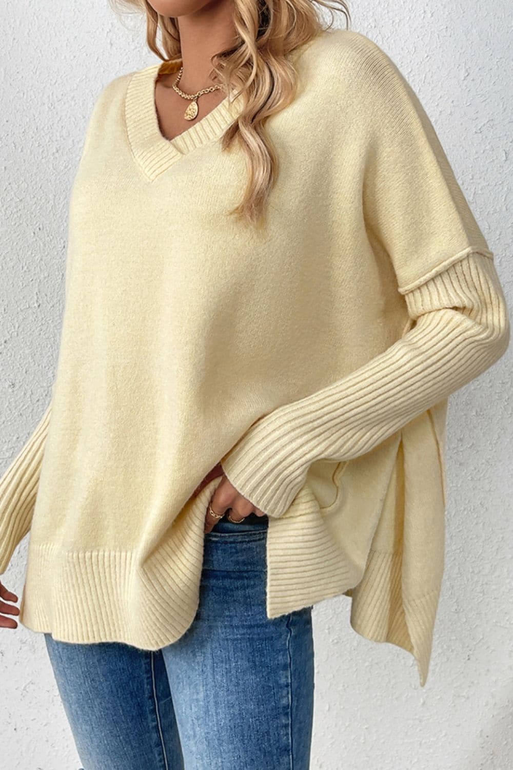 Slit V-Neck Dropped Shoulder Sweater.