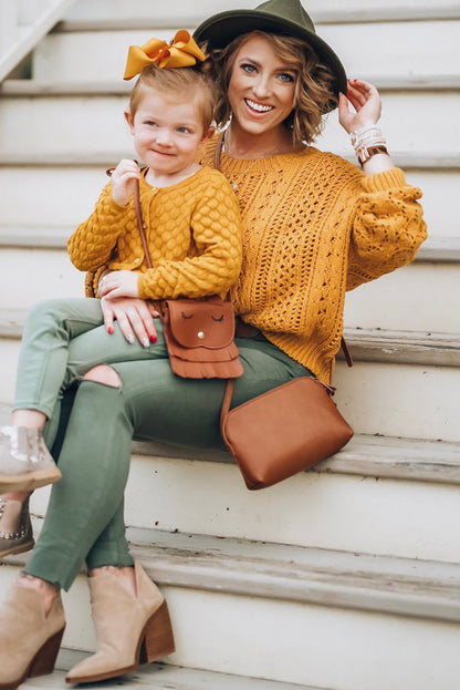 Chic yellow cable knit sweater with hollow-out design and drop shoulders