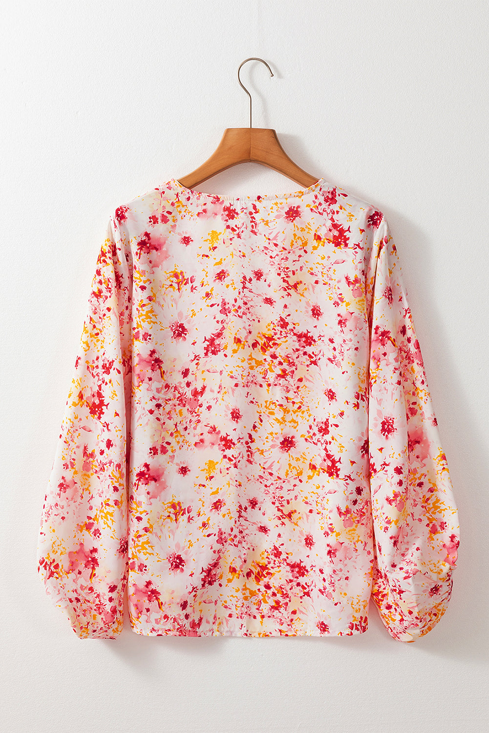 Charming pink floral v-neck blouse with bubble sleeves