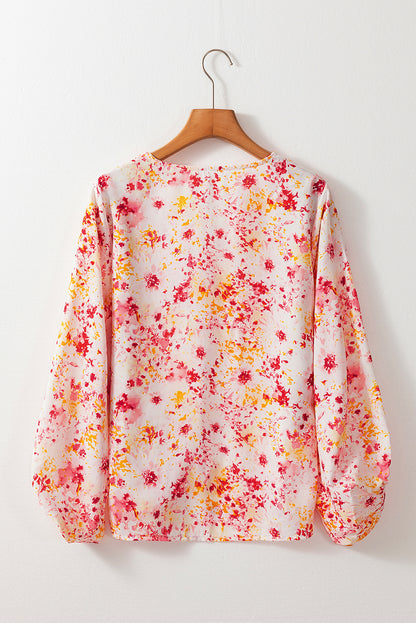 Charming pink floral v-neck blouse with bubble sleeves