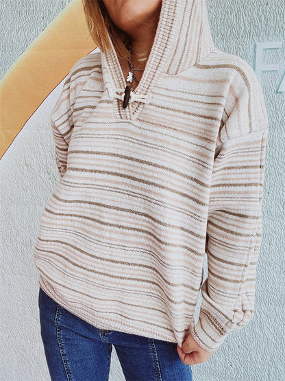 Cozy striped hooded sweater with buttoned details