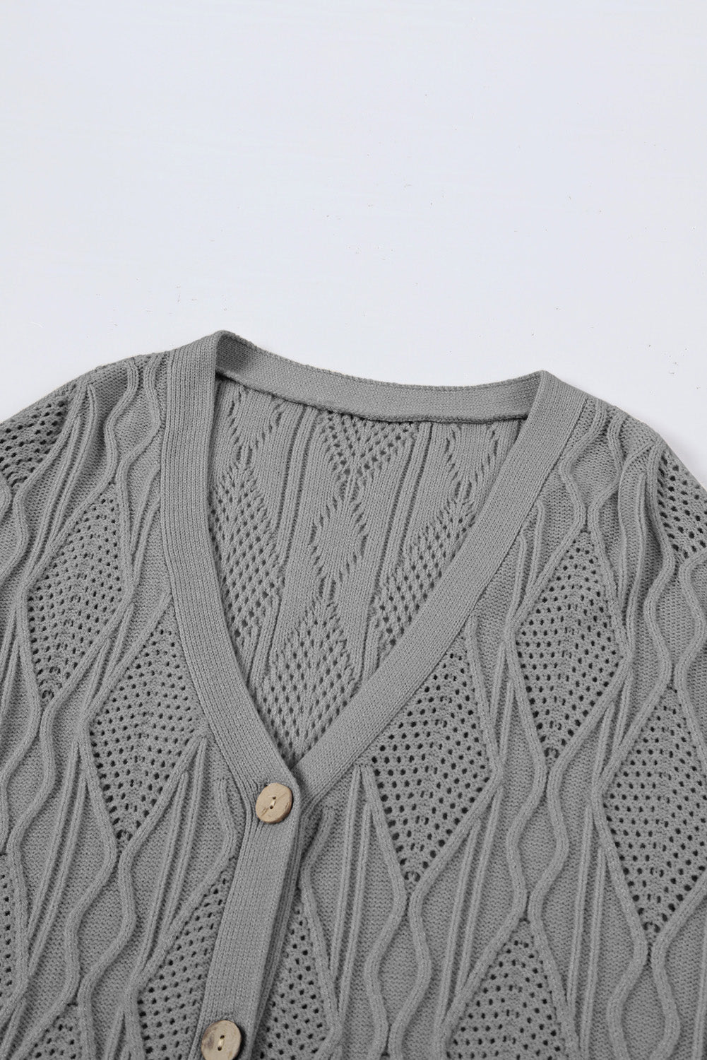 Chic gray plus size knitted cardigan with hollow-out details and button front