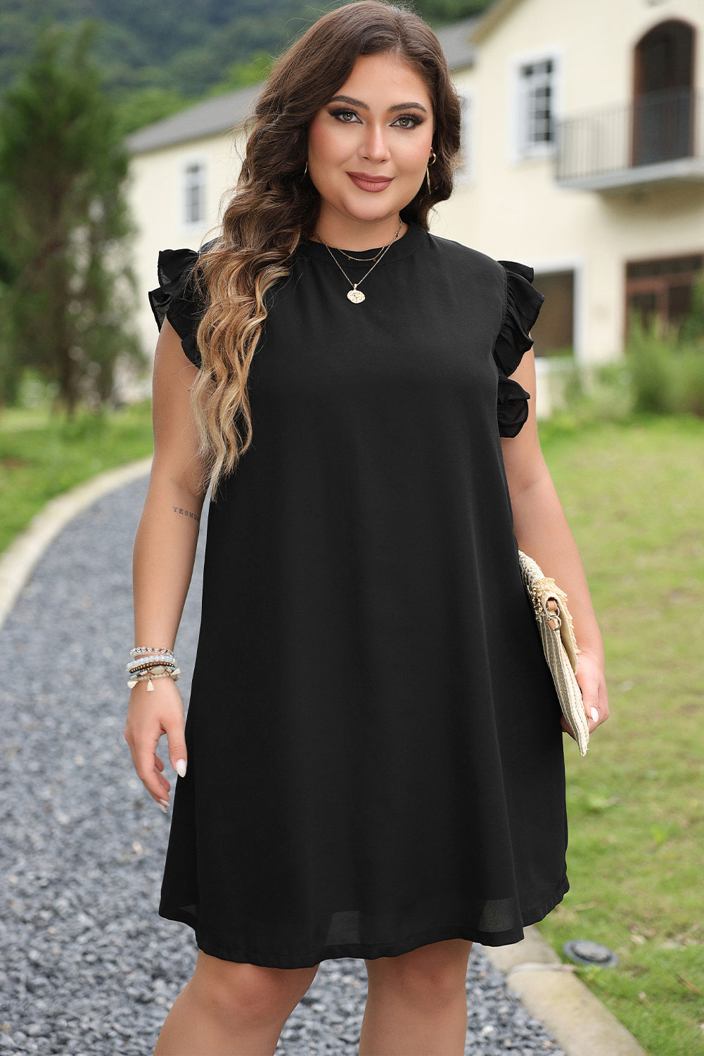 Chic black ruffled plus shift dress with keyhole back