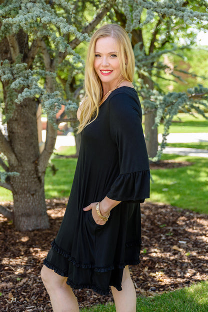 Chic black plus size ruffled sleeve dress for effortless elegance