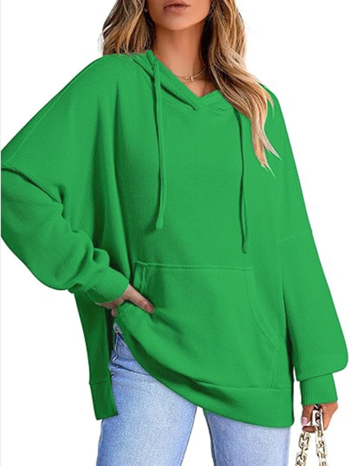 Sleek pocketed hoodie with drawstring and side slit