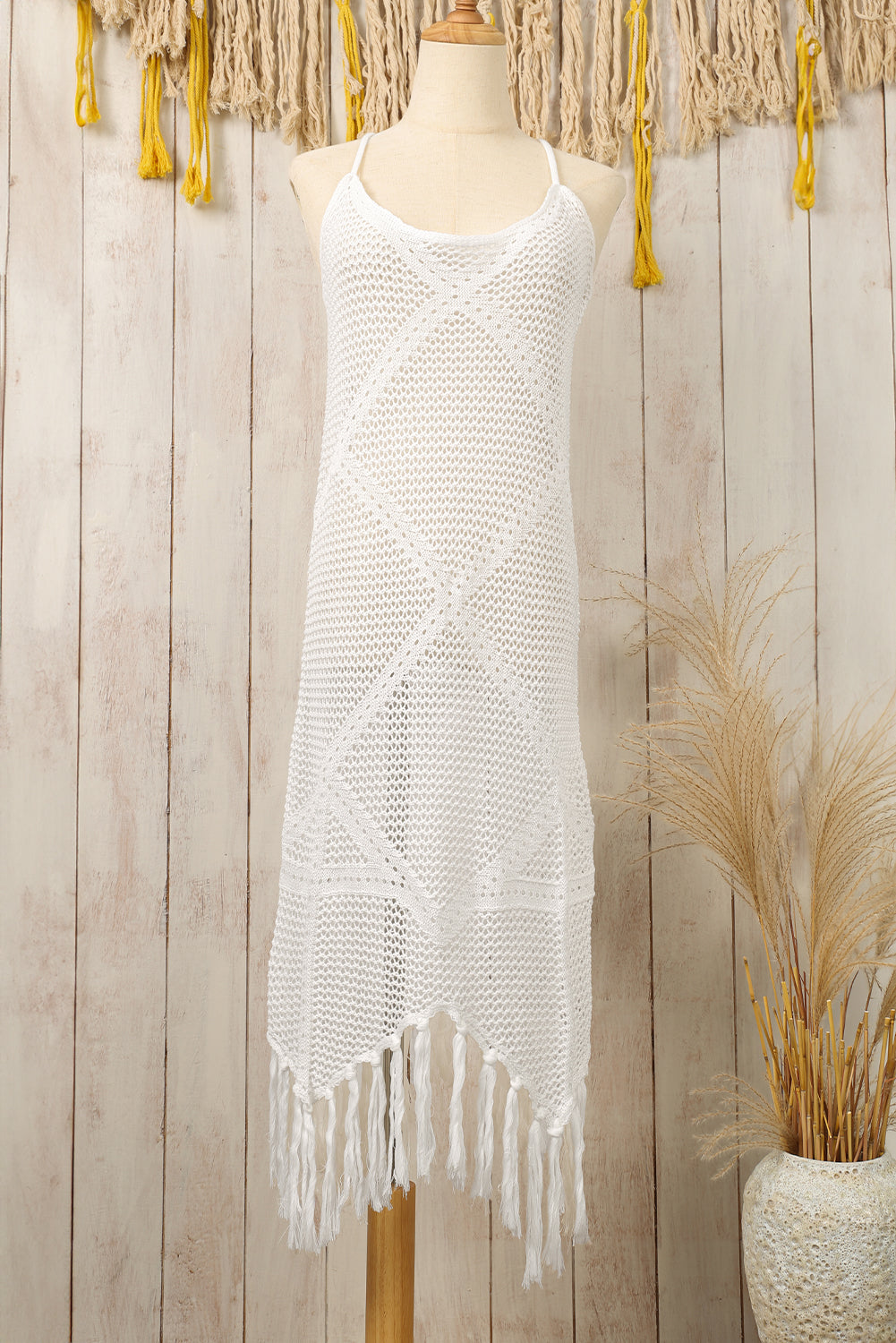 Elegant white beach dress with crisscross back and tassel details